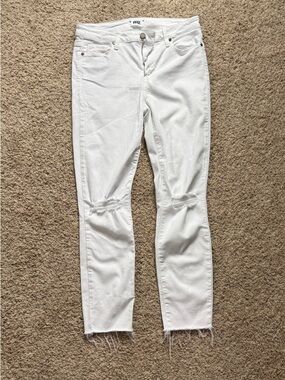 PAIGE White Skinny Jeans with Knee Rips and Raw Hem